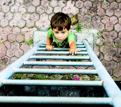 Kid climbing a ladder-- accommodations