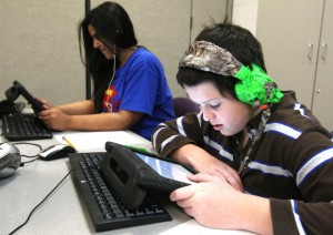 Students listen to audiobooks at Arcola Elementary